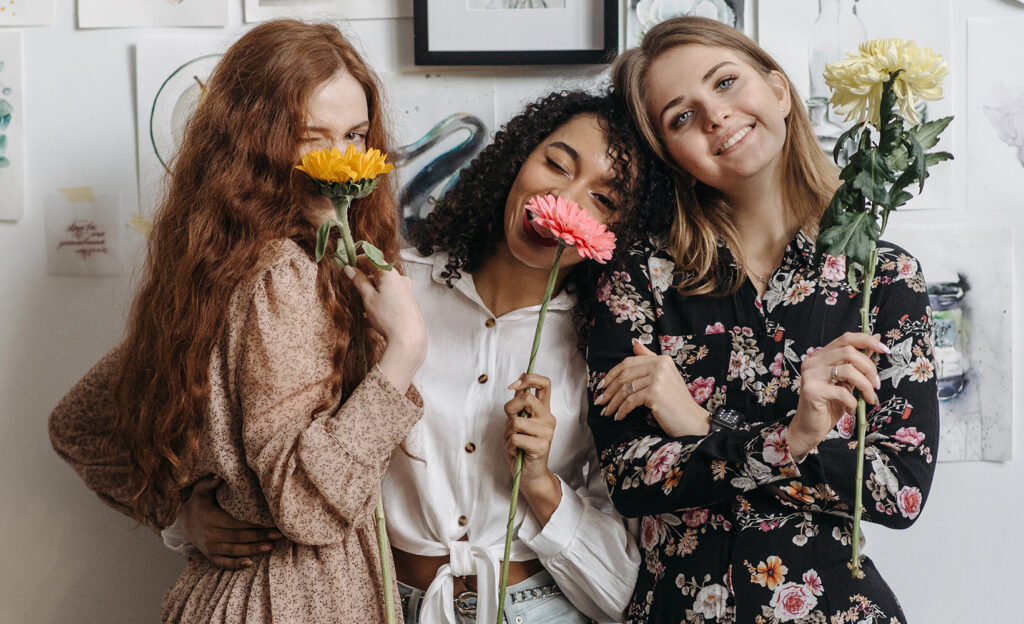 women holding flowers